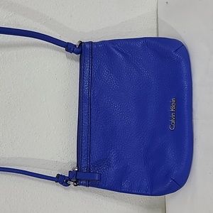 NWOT CALVIN KLEIN  LEATHER CROSSBODY BAG .